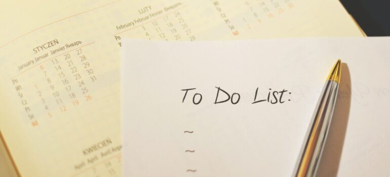 A To Do list placed next to a calendar.