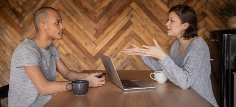 A man consulting with a woman.