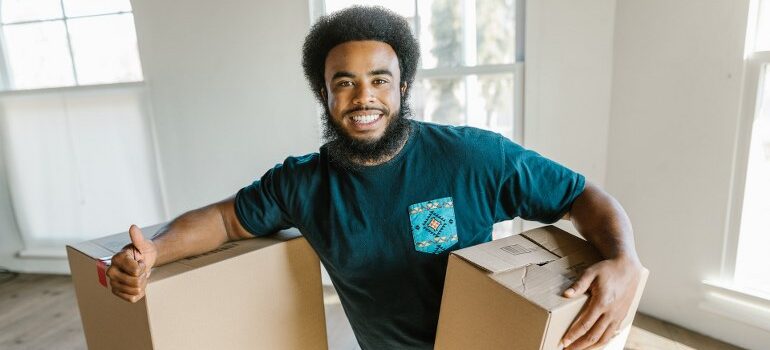 A smiling moving professional.