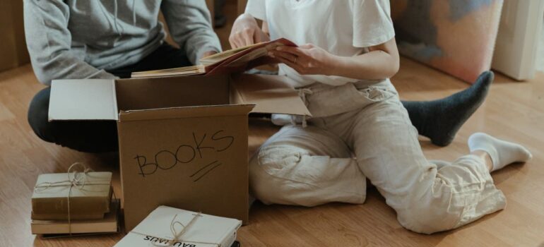 People packing boxes for relocation.