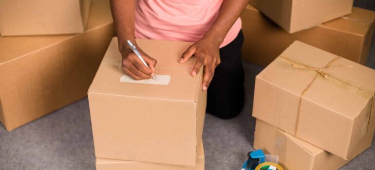 woman packing boxes