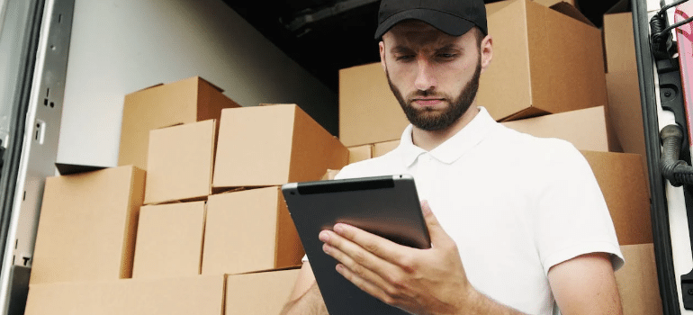 Man reading how to match your moving software with growing operations
