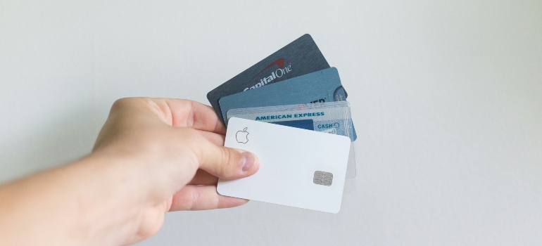 Man holding payment cards